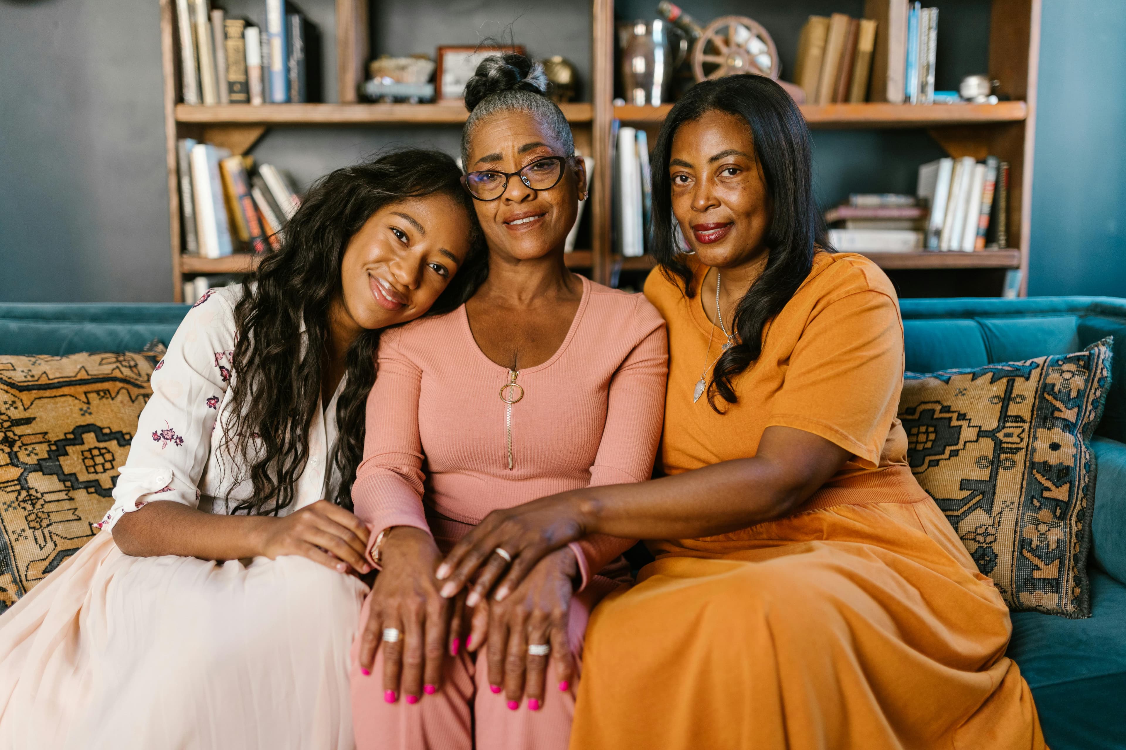 Three generations of Black women — connected, warm, and present
