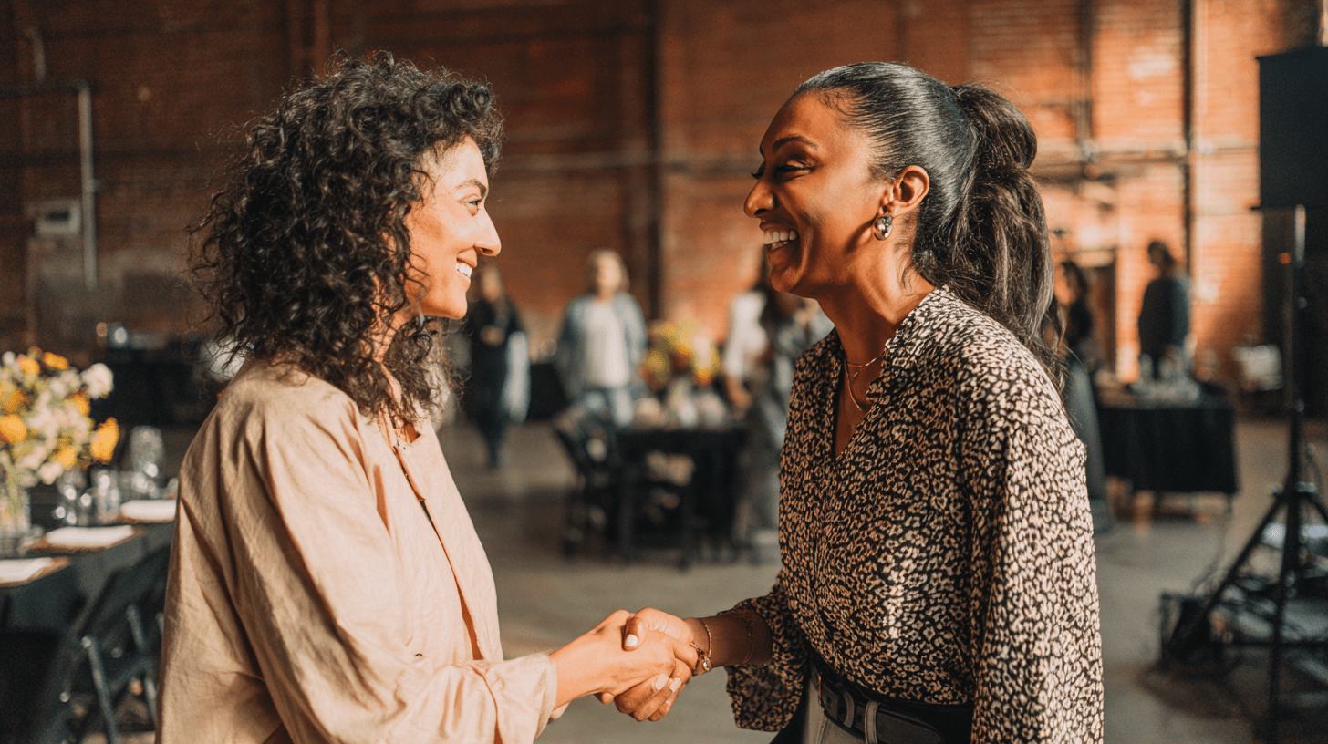 Two professional women connecting at the event
